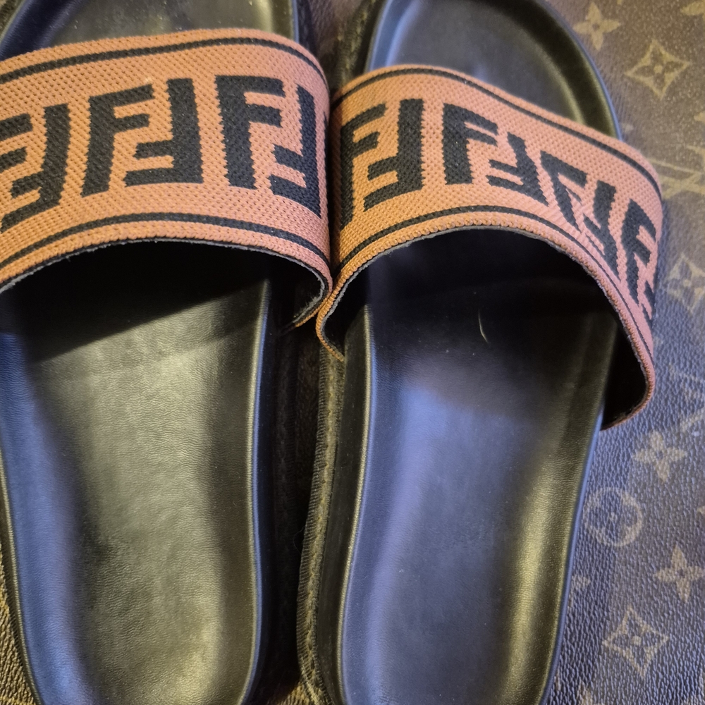 Fendi Logo Slide Sandals in Black and Orange